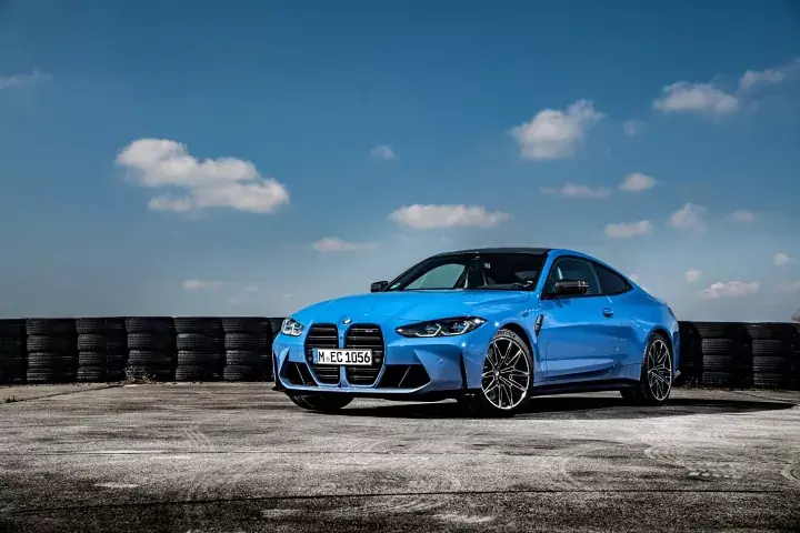 Blue saloon car